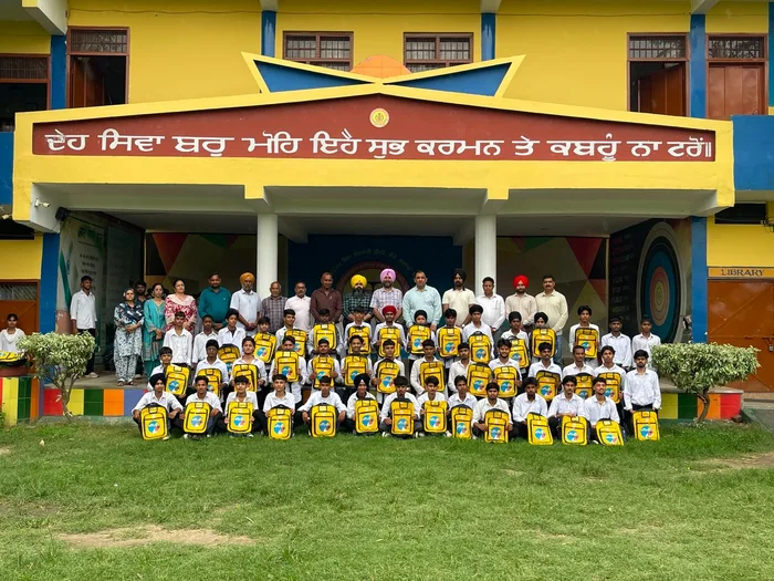 Students at a Jalandhar Central school with bags distributed under the Jalandhar Padhao campaign